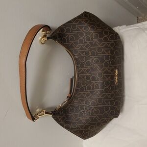 Calvin Klein Dark Brown CK Monogram Shoulder Bag. This Original Dark Brown.